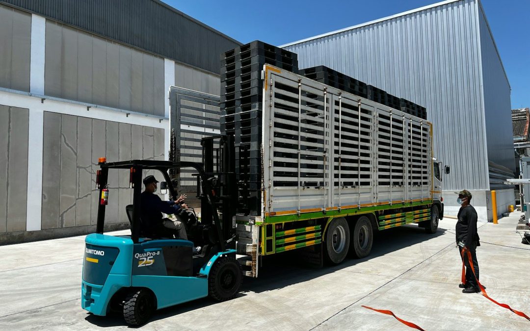 a person loading a large truck